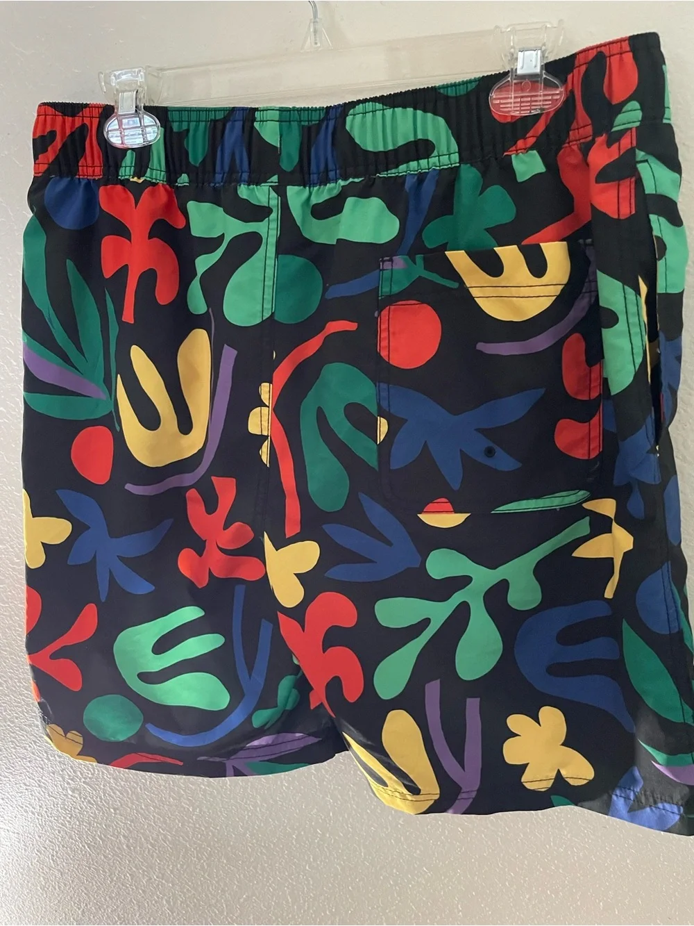 Hanna Andersson Black Swim Shorts with Bold Multicolor Abstract Print